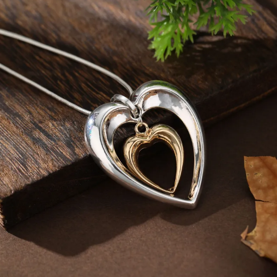 Hollow Heart-Shaped Pendant Necklace in Two Tones