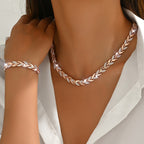 Elegant Fishtail Set with Glass and Gemstones